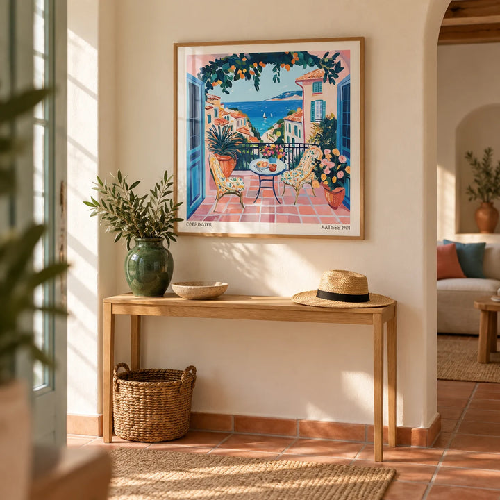 French Coastal Wall Art, framed on the wall of a bright hallway with a warm white wall and a terracotta floor