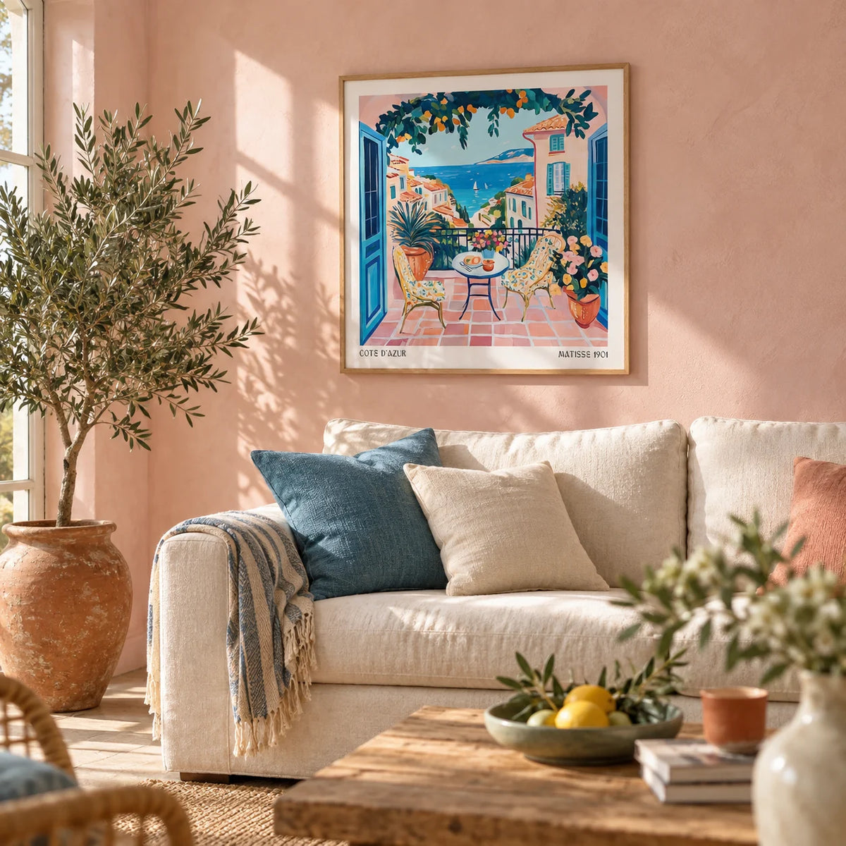 French Coastal Wall Art, framed on the wall of a bright living room with a soft blush pink limewashed wall