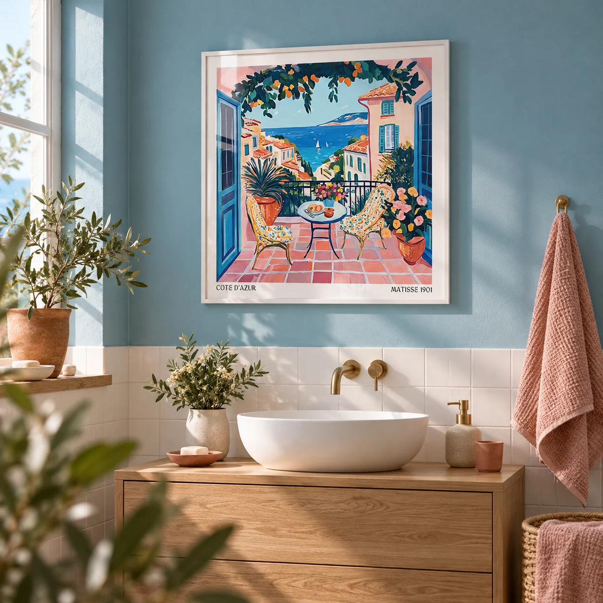 French Coastal Wall Art, framed on the wall of a calm coastal bathroom with a sea blue painted wall and plain white tiles below