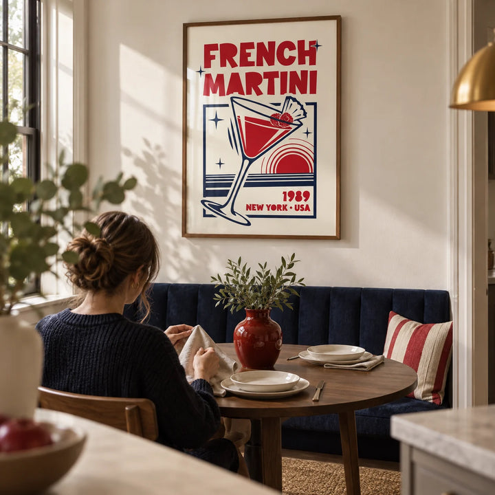 French Martini Poster, framed on the wall of a compact dining room in a renovated UK terrace with an ivory wall