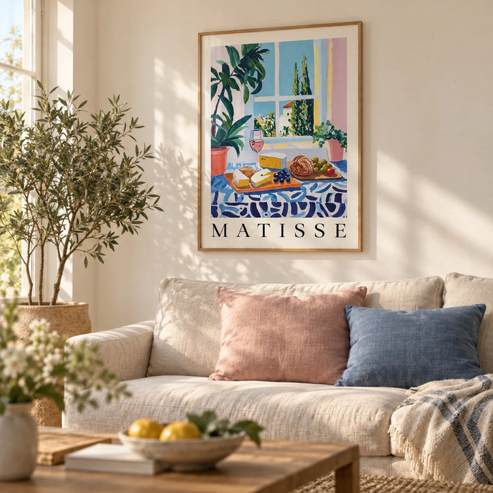 French Prints, framed on the wall of a relaxed living room with a warm white wall