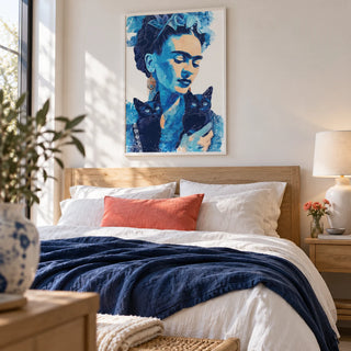 Wall Art Frida Kahlo, framed on the wall of a calm bedroom with a soft white wall