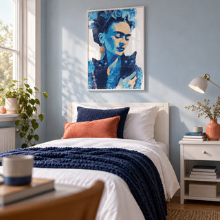 Wall Art Frida Kahlo, framed on the wall of a fresh single bedroom for a young adult (18-25) with a pale blue painted wall
