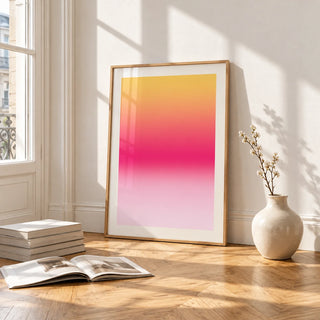 Fuchsia Wall Art, framed and leaning on the parquet floor of a bright living room