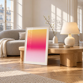 Fuchsia Wall Art, framed and leaning against a coffee table in a bright living room