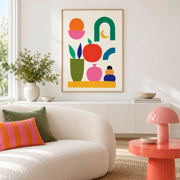 Fun Colorful Print, framed on the wall of a white and pink living room