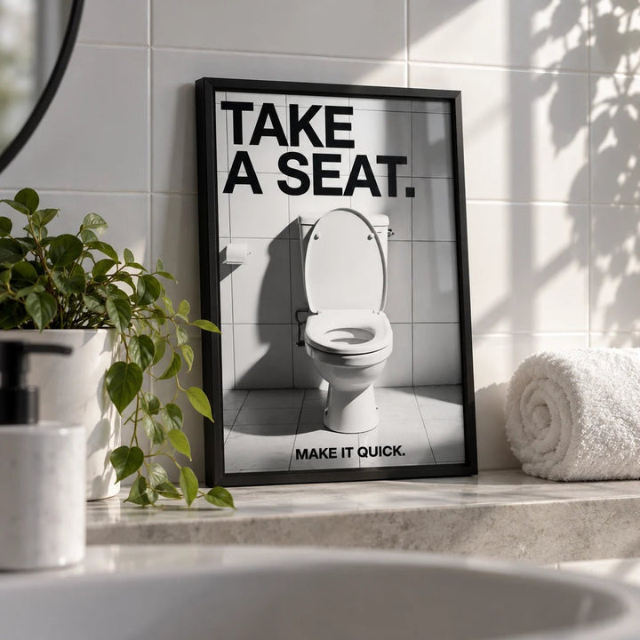 Funny Bathroom Art, a small A4 framed print leaning on a bathroom shelf