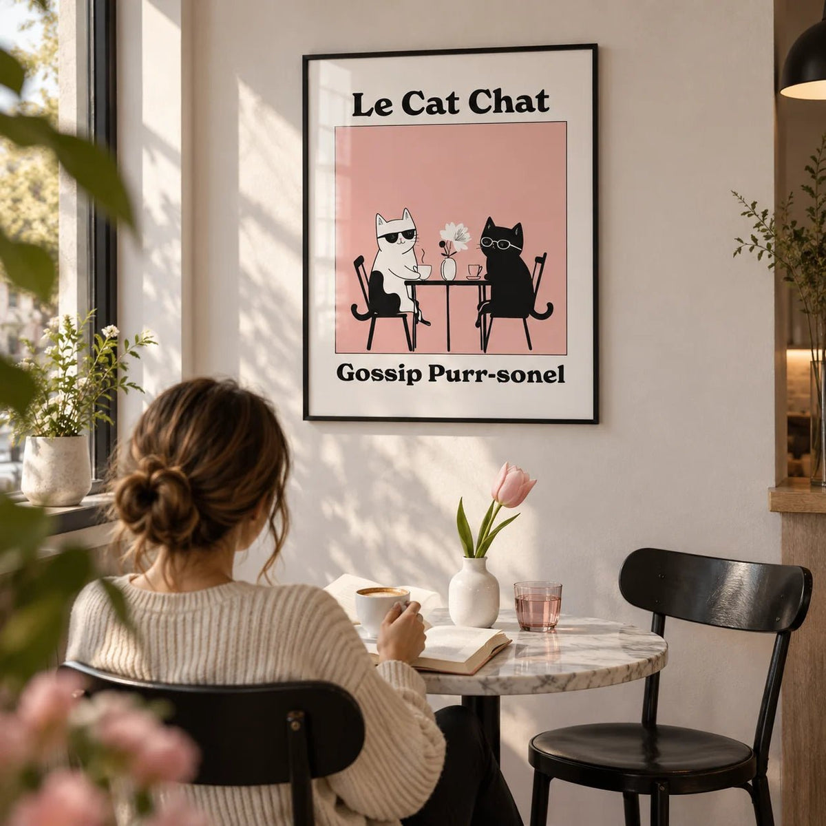 Funny Cat Artwork, framed on the wall of a small café-style dining corner in a kitchen