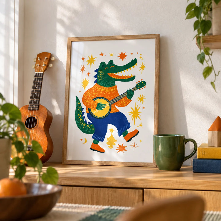 Funny Crocodile Art Print, a small A4 framed print leaning on an oak shelf in a living room