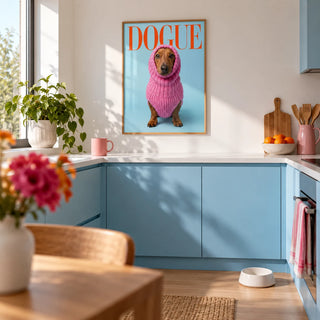 Funny Daschund Print, framed on the wall of a bright kitchen with plain sky blue cabinets and a white worktop