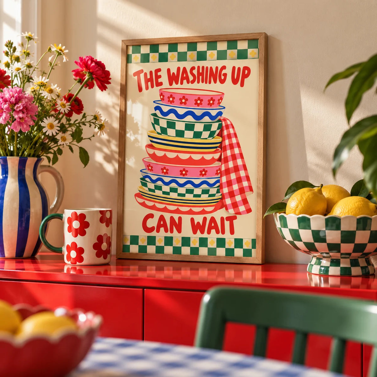 Funny Kitchen Wall Art, a small A4 framed print leaning on a colourful lacquered shelf in a living room