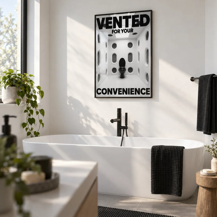 Funny Toilet Sign, framed on the wall of a bright family bathroom with plain white walls