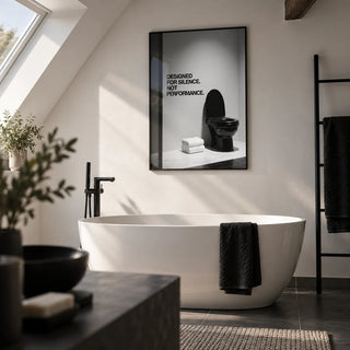 Funny Toilet Wall Art, framed on the wall of a loft bathroom with a sloping white ceiling