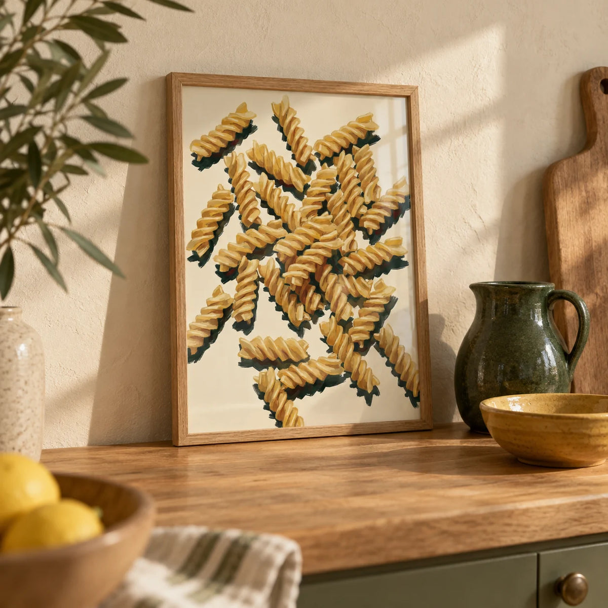 Fusilli Pasta Art, a small A4 framed print leaning on an oak kitchen worktop