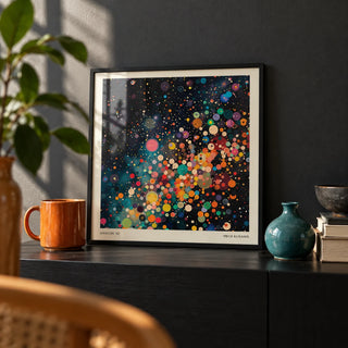 Galaxy Posters, a small A4 framed print leaning on a black shelf in a living room