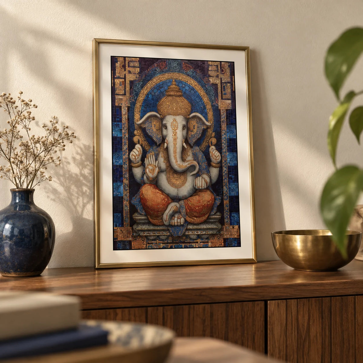 Ganesha Wall Art, a small A4 framed print leaning on a walnut sideboard in a living room