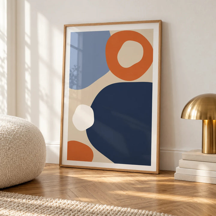 Geometric Abstract Art, framed on the wall of a calm white room with a white skirting board and herringbone oak parquet