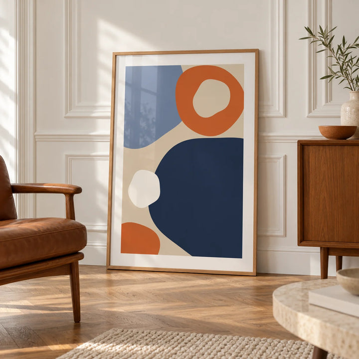 Geometric Abstract Art, framed on the wall of an elegant room with white panelled walls with classic mouldings and a herringbone oak floor in soft side light