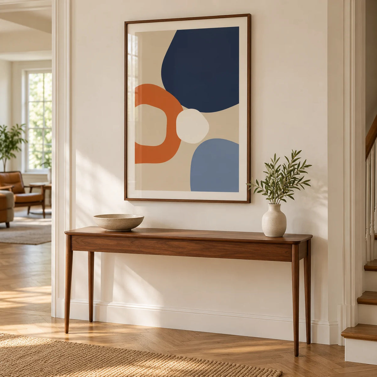 Geometric Abstract Wall Art, framed on the wall of a hallway with a warm white wall and herringbone oak floor