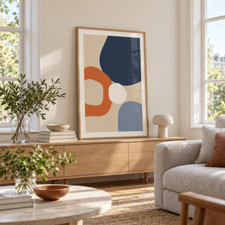 Geometric Abstract Wall Art, framed on the wall of a light living room with big windows