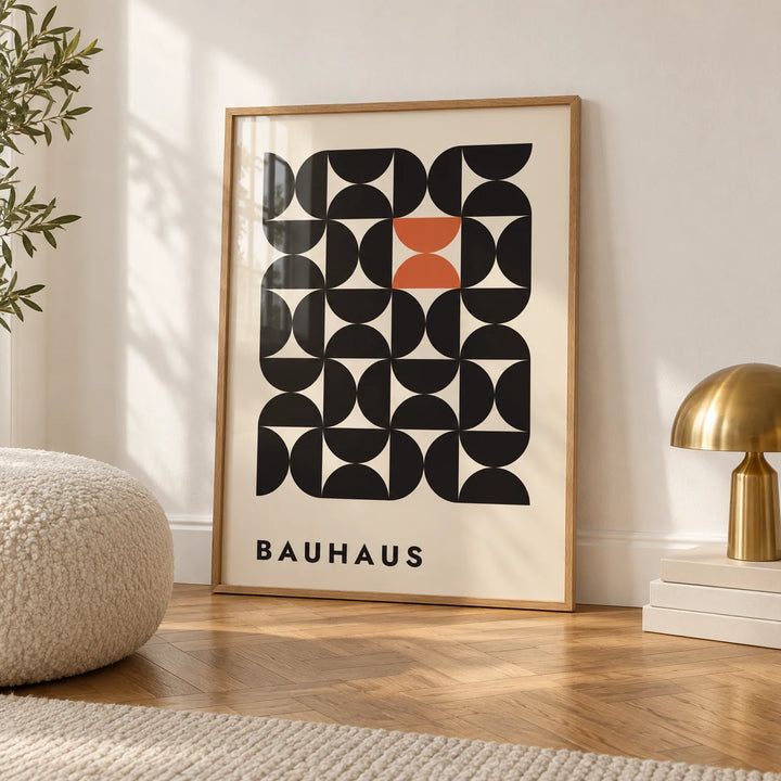 Geometric Bauhaus Art, framed on the wall of a calm white room with a white skirting board and herringbone oak parquet