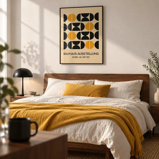 Geometric Bauhaus Poster, framed on the wall of a modern bedroom with a white wall