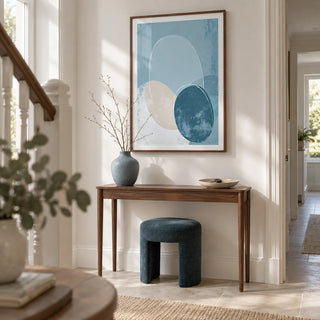 Geometric Circle Poster, framed on the wall of a welcoming hallway in a renovated UK terrace with chalk white walls and pale stone flooring