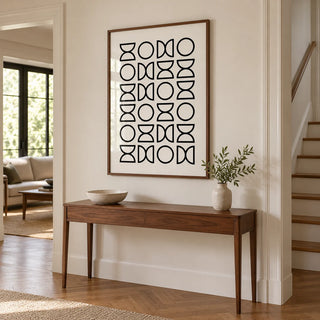 Geometric Lines Art, framed on the wall of a hallway with a warm white wall and herringbone oak floor
