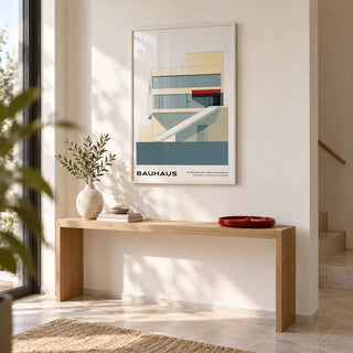 Geometric Mid Century Modern Art, framed on the wall of a bright entrance hall with a white wall and a pale stone floor