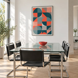 Geometric Prints, framed on the wall of a bright dining room with a glass table