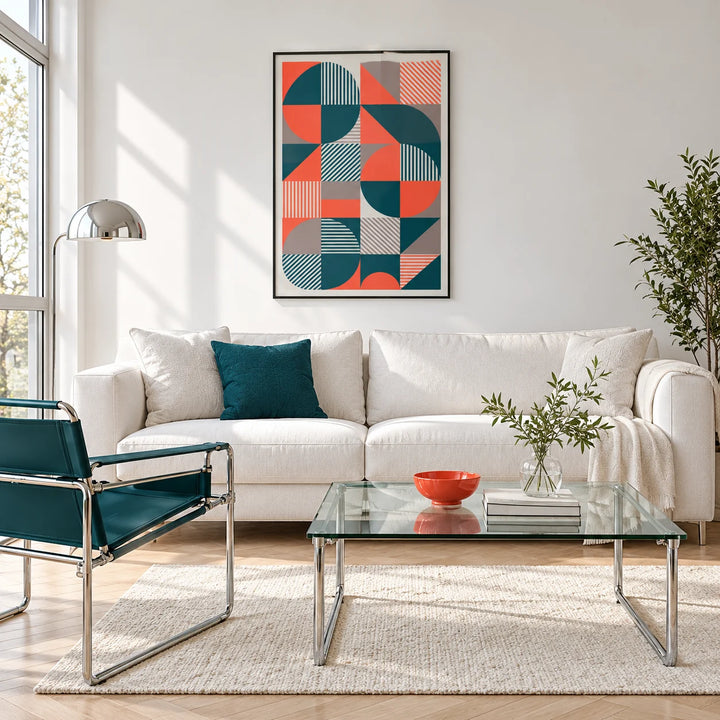 Geometric Prints, framed on the wall of a bright white living room with chrome furniture