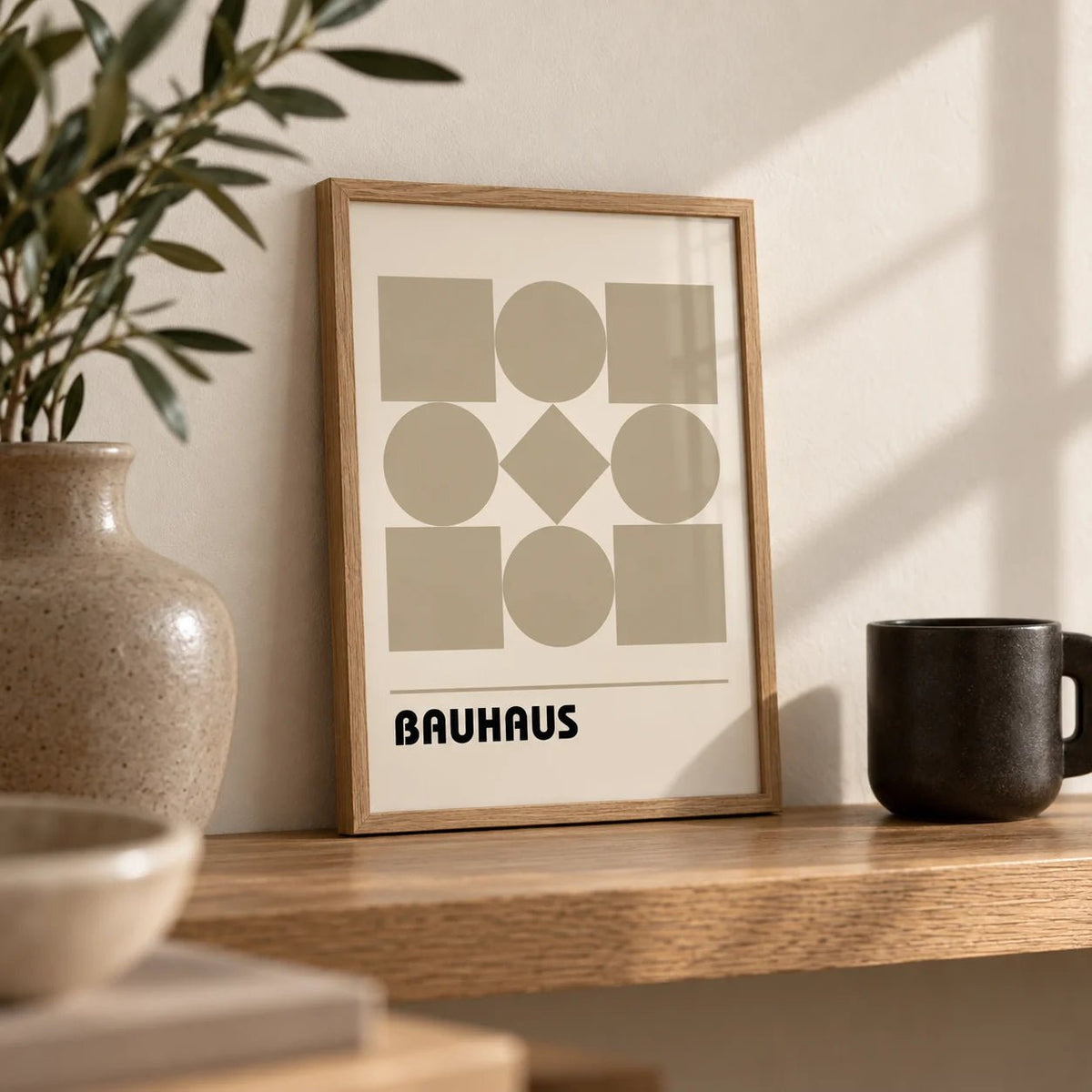 Geometric Shape Art, a small A4 framed print leaning on an oak shelf in a living room