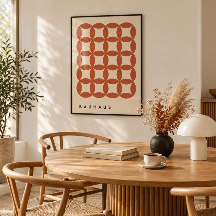 Geometric Wall Hanging, framed on the wall of a warm in a dining room