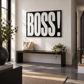 Gift for Boss, framed on the wall of a modern monochrome hallway with a white wall and a dark grey floor