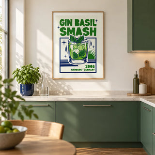 Gin Basil Smash Poster, framed on the wall of a modern kitchen in a UK city flat with flat-front green cabinets