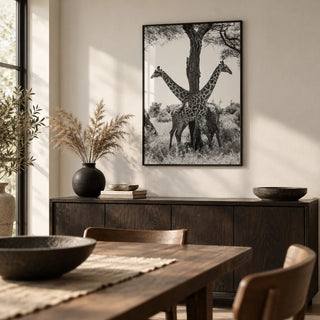 Giraffe Black And White Art Print, framed on the wall of a calm dining room