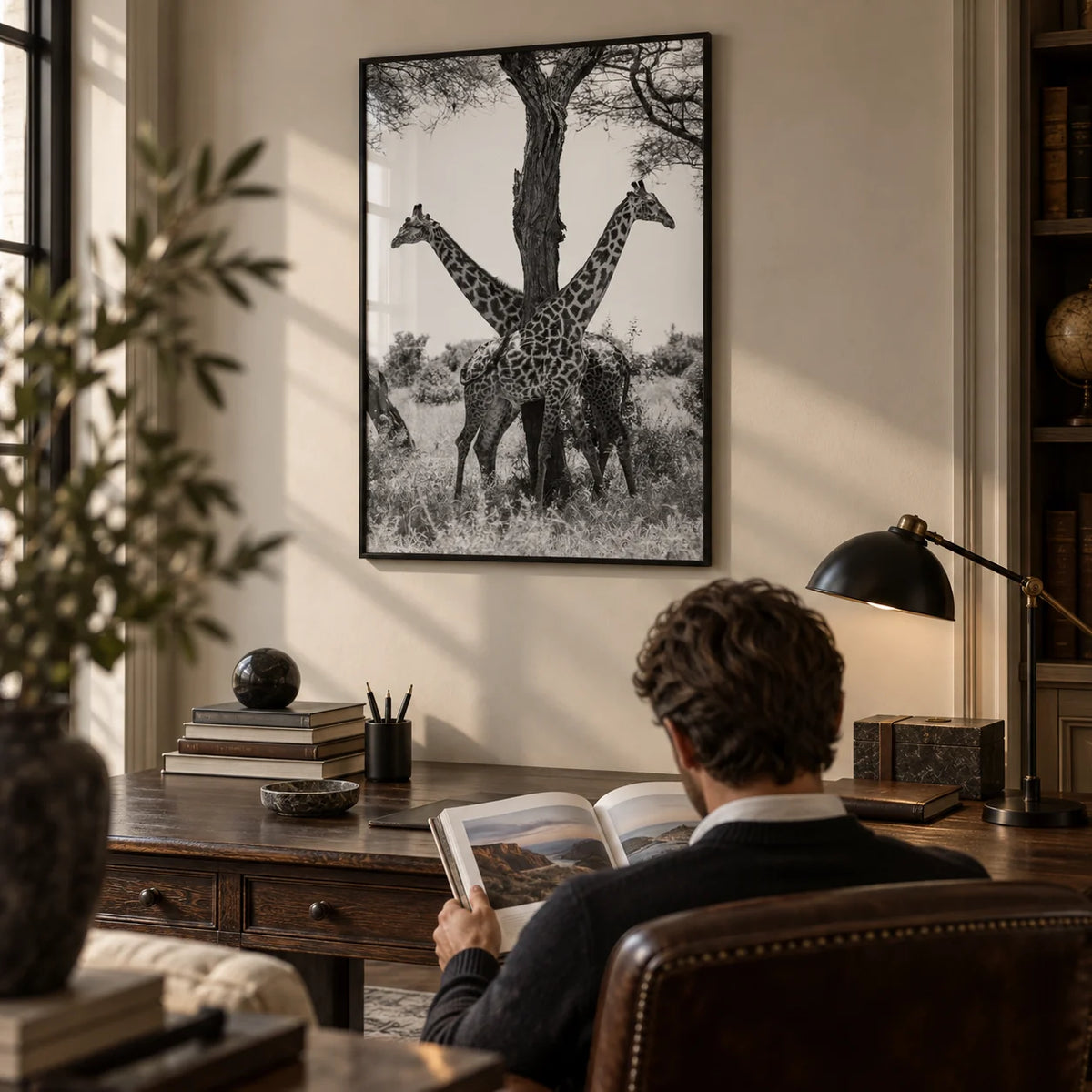 Giraffe Black And White Art Print, framed on the wall of a classic home office