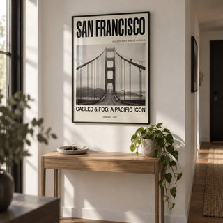 Golden Gate Bridge Art Print, framed on the wall of a modern hallway with a white wall