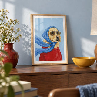 Golden Retriever Art, a small A4 framed print leaning on a walnut sideboard in a living room