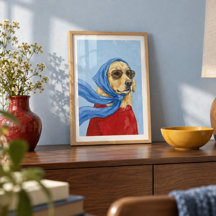 Golden Retriever Art, a small A4 framed print leaning on a walnut sideboard in a living room