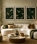 Living room with a white sofa, decorative pillows, and framed artwork on the wall.