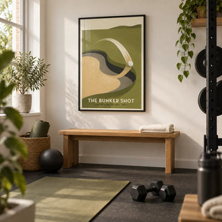Golf Bunker Art Print, framed on the wall of a compact home gym in a converted UK spare room with a warm white wall and charcoal rubber floor