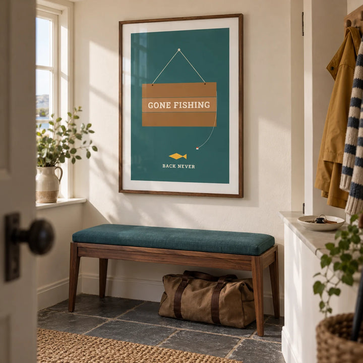 Gone Fishing Poster, framed on the wall of a practical hallway in a British coastal cottage updated with clean modern furniture