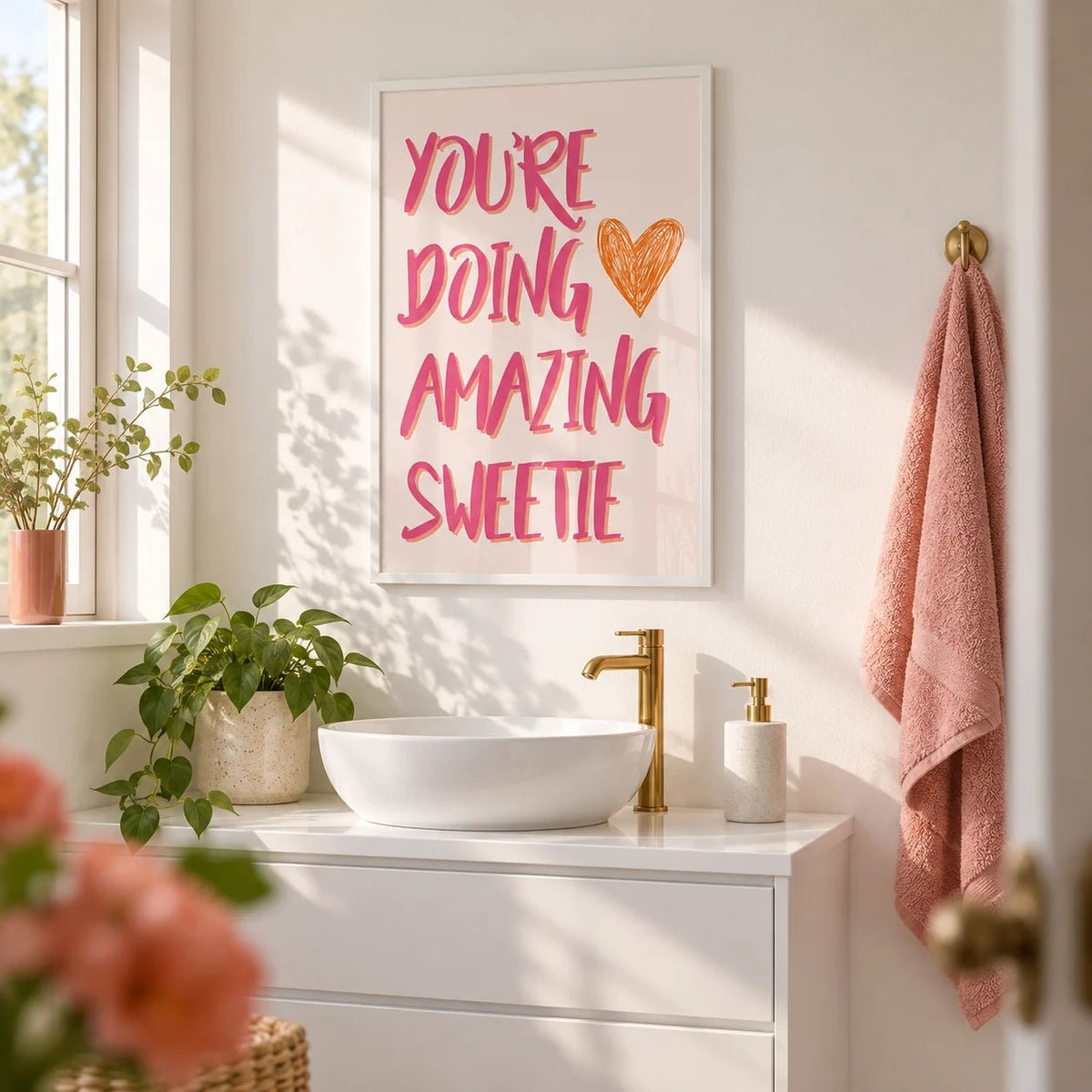Good Motivational Posters, framed on the wall of a bright bathroom