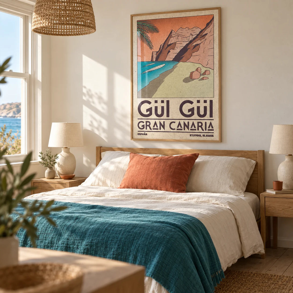 Gran Canaria Beach Art Print, framed on the wall of a relaxed coastal double bedroom in a British seaside home with warm white walls and pale wooden floorboards