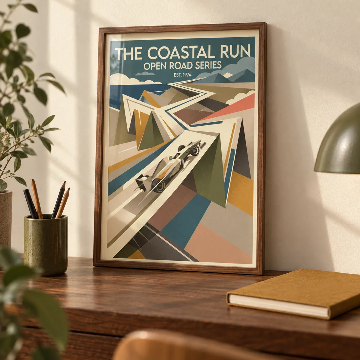 Grand Prix Race Poster, a small A4 framed print leaning on a walnut desk