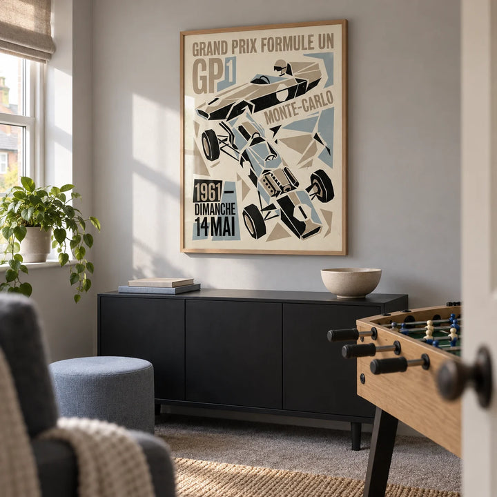 Grand Prix Typography Art Print, framed on the wall of a compact spare-room games den in a UK semi-detached home with a pale grey wall
