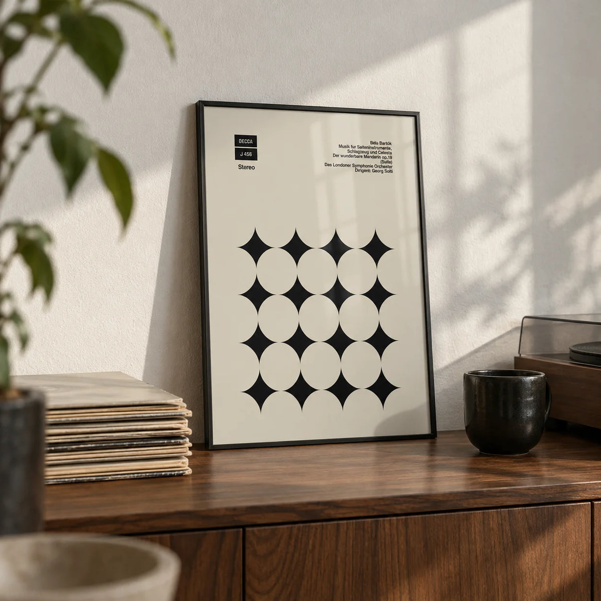 Graphic Art Poster, a small A4 framed print leaning on a walnut sideboard in a living room
