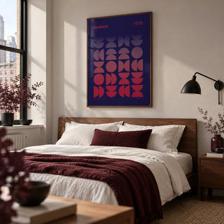 Graphic Design Poster, framed on the wall of a crisp modern bedroom in a city flat