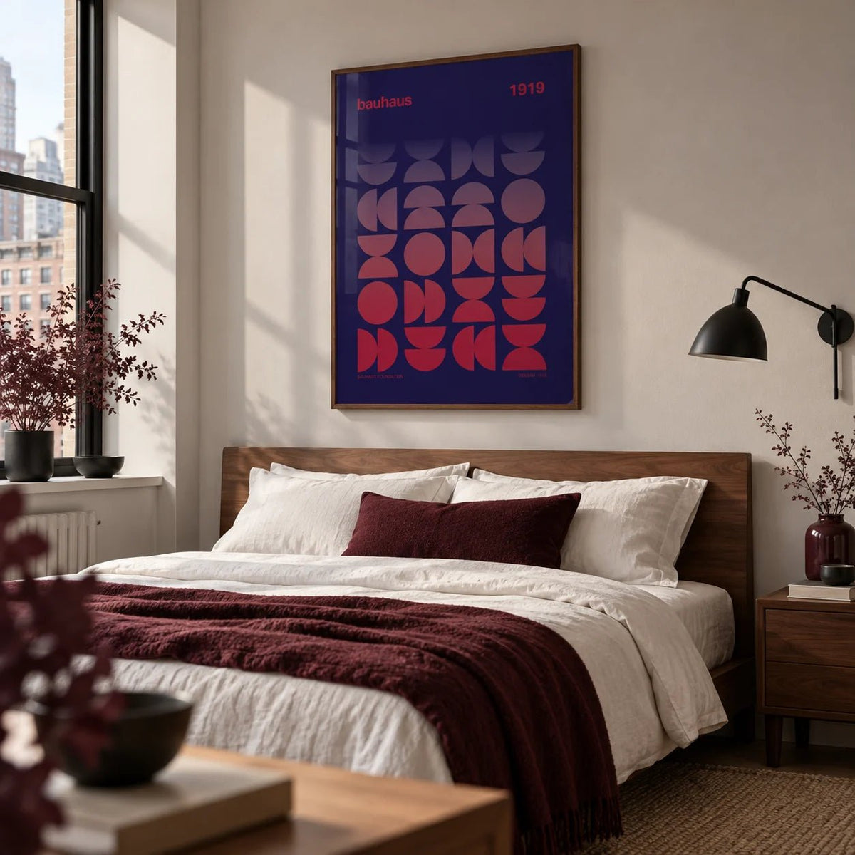 Graphic Design Poster, framed on the wall of a crisp modern bedroom in a city flat